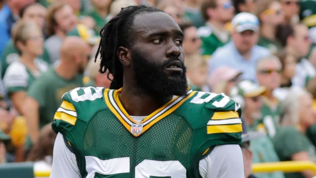 Sep 24, 2023; Green Bay, Wisconsin, USA; Green Bay Packers linebacker De'Vondre Campbell (59) leaves the field after getting injured against the New Orleans Saints at Lambeau Field. Mandatory Credit: Dan Powers-USA TODAY Sports  